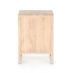 Open bottom drawer viewed at front showing metal slide hardware and wood joinery