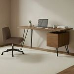Sally Office Chair styled next to wooden desk with laptop in neutral toned minimalist room