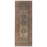 Southwestern runner rug with mini-medallions in brown, blue, and tan geometric patterns, size 3 by 10 feet
