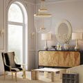 Osa Drinks Table as part of a classic living room setting with vintage furniture, chandelier, and decor