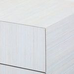 Close-up of corner showing pin-stripe texture and clean edges of the platinum lacquered silk grasscloth