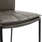 Padded leather seat cushion with visible horizontal stitching and slightly rounded front edge