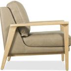 Side profile highlighting angled light wood arms and thick seat cushion of Ashland Chair