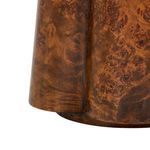 Detailed close-up of the grooved walnut burl pedestal base showing intricate wood pattern
