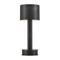 Full front view of Traverse lamp against plain light background with unlit black metal shade