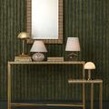 Gatsby Table Lamp on gold side table next to console table with other lamps and decor