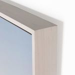 Close-up showing the smooth surface and white wood grain detail on the frame