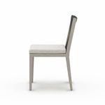 Side view with cushion visible and rope backrest showing texture in neutral lighting
