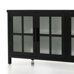 Close-up showing corner detail of the media console’s flat top with fine border lines