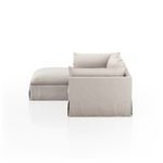 Close side angle showing layered back cushions and tapered shelter arm design