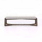 Front profile of the bench highlighting the dark wood base cross structure and flat upholstered seat