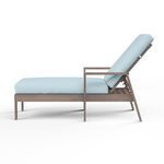 Side profile of Laguna Chaise Lounge showing adjustable backrest and armrest in driftwood finish