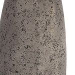 Close-up of the textured concrete base showing dark mottled pattern and subtle sheen