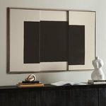 Wall-mounted Sarsen artwork above console with open book and sculptural torso