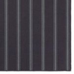 Detailed view focused on edge with navy background and light blue parallel stripes