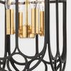 Close-up of black iron and gold finish forming a multi-light clustered fixture