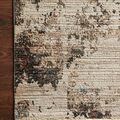 Leigh Ivory Charcoal Rug with distressed traditional motifs in ivory, charcoal, tan, and subtle blue accents