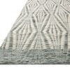 Keniz Ivory Sage Rug angled low side view highlighting raised woven texture and defined geometric pattern