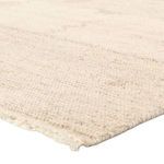 Close-up angle of Eurydice rug showing dense wool texture and handknotted edge detail