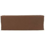 Back of sofa showing full slipcover in terracotta linen fabric with simple seams