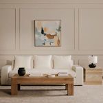 Contemporary living room featuring natural wood coffee table and Rosa accent table with lamp on right.