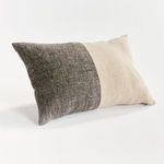 Jules Pillow angled slightly to show plush volume and fabric texture in natural and charcoal tones