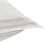 Close-up of fabric showing gray stripes and textured weave on pillow sham corner