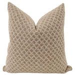 Light brown Lollo Rossa pillow cover with textured diamond pattern and soft fabric on a flat surface