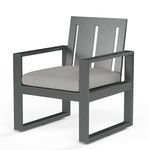Redondo Dining Chair angled view emphasizing armrest and seat cushion with visible texture on aluminum frame