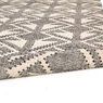 Side low-angle view of Savona Gray / Ivory Rug rolled at one corner highlighting thickness and weave details