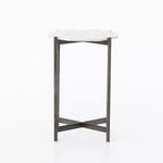 Frontal view showcasing table’s angular aluminum legs and marble top edges