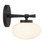 Left side view of black wall sconce arm extending from round backplate to oval glass shade