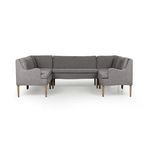 U-shaped dining banquette with high back, gently curved arms, gray flax linen upholstery, and slim tapered wood legs