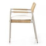 Right profile view showing armrest weaving and chair frame with cushion