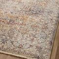 Close view of rug’s vintage pattern and muted color mix without fringe edge