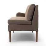 Side profile of banquette highlighting slim armrest and seat cushion thickness
