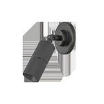 Angled isolated view focusing on cylindrical shade and circular backplate of distressed bronze Truett wall sconce