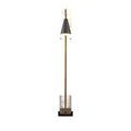 Single black conical shade with brass pole showing narrow side view