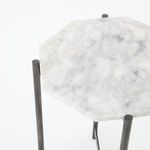 Overhead perspective focusing on marble top with visible faint gray veining and smooth edges