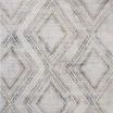 Ivory-toned area rug with classic geometric diamond motifs and subtle textured layering