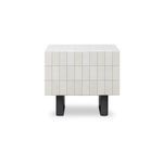 Square outdoor side table with glazed concrete top featuring a white grid pattern and matte black metal-inspired legs