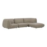 Zeppelin sectional shown from a low side angle highlighting curved back cushions and soft fabric texture
