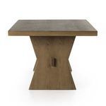 Close-up of oak wood grain on tabletop emphasizing natural patterns and matte finish