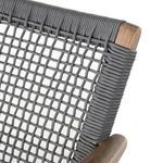 Rear angle showing precise weaving of thick gray cords on sculpted wooden frame