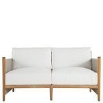 Front angle of loveseat showing white cushions with beige fabric-covered arms