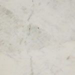 Detailed view of white marble showing subtle veining and natural texture