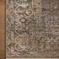 Detailed close-up of Heritage Mocha / Denim rug corner on wooden floor highlighting vintage motifs and border