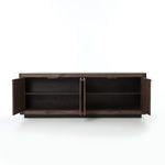 Sideboard showing open doors revealing interior shelving and storage space
