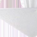 Close-up of white inverted pyramid base with textured matte finish