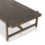 Corner detail showing mitred edges of the wood planks and smooth finish on tabletop